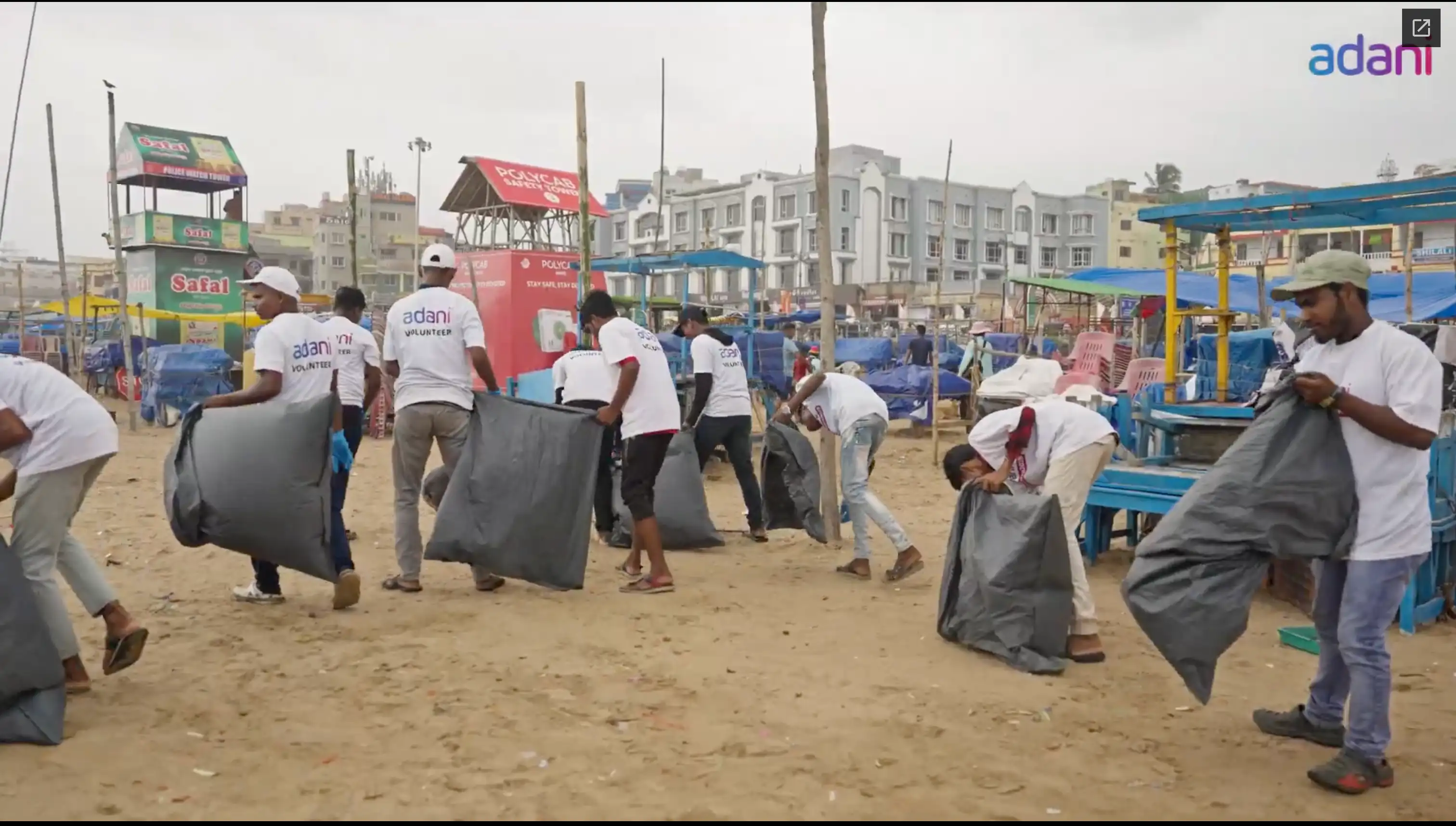 Adani volunteers cleaning a beach ahead of Rath Yatra 2025