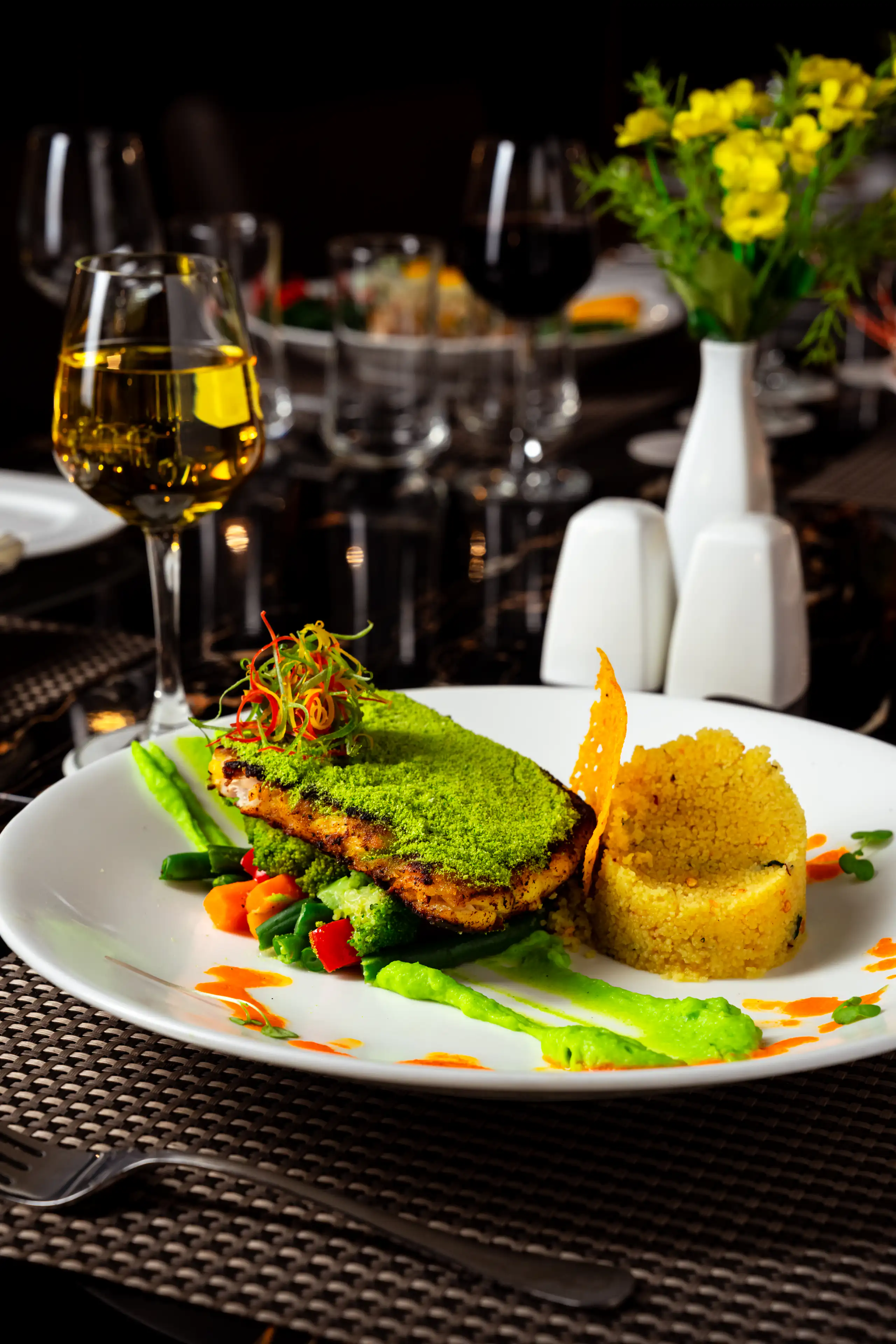 Vertical restaurant food composition with a dark softly focused background